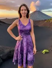 Female Middle Aged Posing At Hawaiian Sunrise Hike To A Volcano Crater face swap