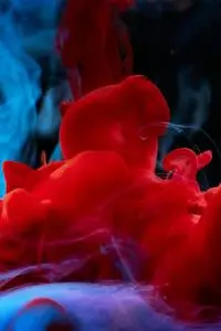High Speed Photography of Colorful Ink Diffusion in Water phone wallpaper background