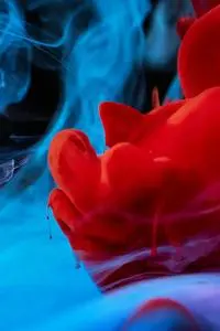 High Speed Photography of Colorful Ink Diffusion in Water phone wallpaper background