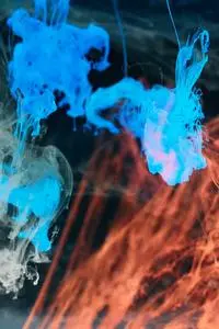 High Speed Photography of Colorful Ink Diffusion in Water phone wallpaper background
