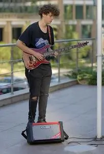Boy Casual Playing Electric Guitar phone wallpaper