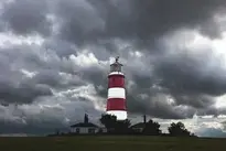 Lighthouse Tower Storm Clouds Sky wallpaper