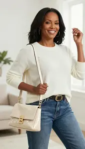 Elegant Woman Sweater And Jeans Dancing Pose