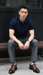 Professional Man Polo And Trousers Sitting On Bench