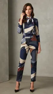 Young Woman In 20s Sophisticated Woman In Abstract Print Professional Top And Dress Pants