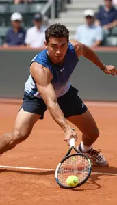 Clay Court Tennis Athlete In Sleeveless Top Sliding Into A