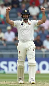 Cricket All Rounder In Traditional Whites Celebrating After