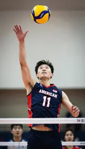 Energetic Scene Of A Volleyball Player In Sleeveless Top