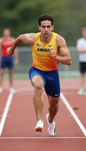 High Jumper In Vibrant Track Attire Beginning Approach Run
