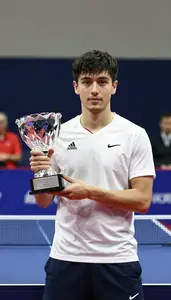 Indoor Table Tennis Grand Finals Winner In Lightweight Shirt