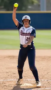 Softball Pitcher In Fitted Jersey And Pants Releasing The