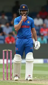 Cricket Captain Setting Field Placements Thoughtful Face