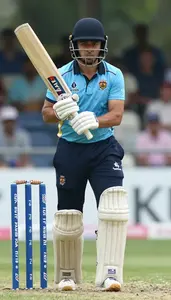 Cricket Tail Ender Wearing Arm Guard Concentrated Running