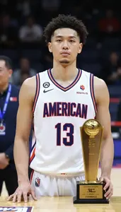 Indoor Basketball Finals Mvp In Sleeveless Jersey Lifting An