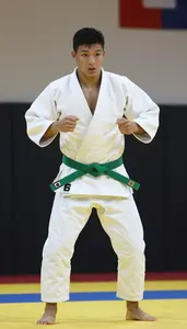 Judo Judoka Wearing Green Belt Focused Grappling Foot Sweep