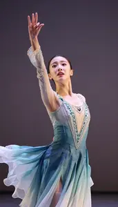 Lyrical Dancer In Flowing Costume And Emotional Expression