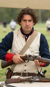 Musket Shooter In Revolutionary War Uniform And Careful