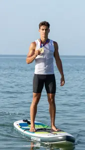 Open Coastal Paddleboard Race Winner In Sleeveless