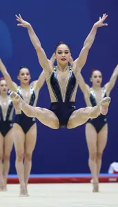 Rhythmic Gymnastics Group Performer Wearing Unitard Dynamic