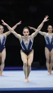 Rhythmic Gymnastics Group Performer Wearing Leotard Focused