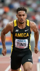 Sprinter In Black And Yellow Kit Nearing Finish Line
