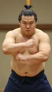 Sumo Wrestler In Mawashi And Topknot Practicing Tsuppari