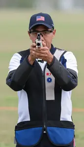 Target Shooter In Competition Jacket And Specialized Glasses