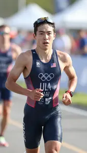 Triathlon Olympic Distance Wearing Triathlon Suit Enduring