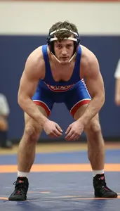 Wrestler In Singlet And Headgear Drilling Penetration Steps