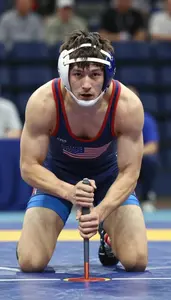 Wrestler In Singlet And Headgear Drilling Penetration Steps