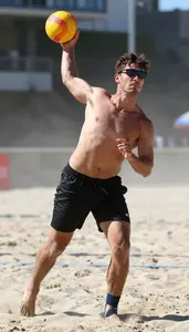 Beach Handball Pivot Wearing Ankle Tape Focused Throwing