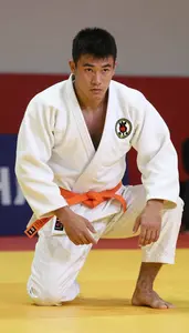 Judo Heavy Judoka Wearing Orange Belt Determined Grappling