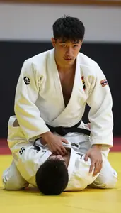 Judo Light Judoka Wearing White Belt Focused Blocking Hip