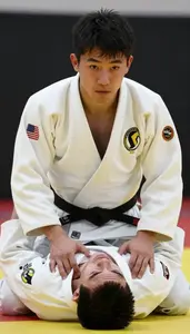 Judo Specialist Wearing Gi Quick Sweeping Chokehold In