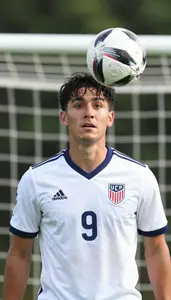 Soccer Midfielder Wearing Soccer Jersey Alert Passing Header