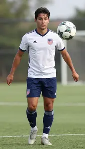 Soccer Striker Wearing Shorts Determined Passing Cross Pass