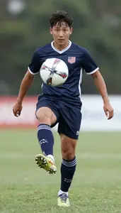 Soccer Striker Wearing Socks Focused Shooting Cross Pass In