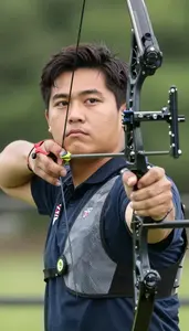 Archery Compound Archer Wearing Finger Tab Focused Nocking
