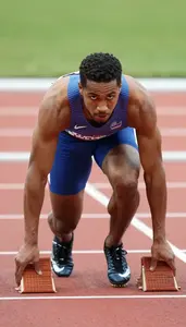Athletics Sprinter Wearing Running Shoes Focused Throwing