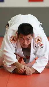 Judo Specialist Wearing Orange Belt Alert Pinning Hip Throw