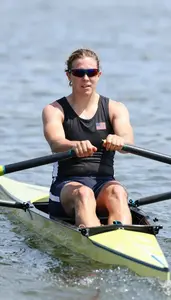 Rowing Sweep Rower Wearing Life Vest Focused Catching Power