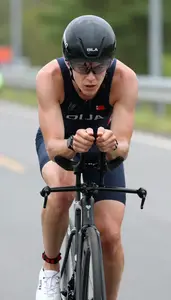 Triathlon Sprint Triathlete Wearing Goggles Focused Cycling