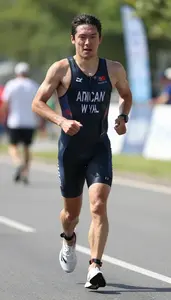 Triathlon Sprint Triathlete Wearing Triathlon Suit Focused