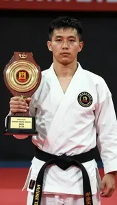 Wushu Sanda Fighter Wearing Sash Showcasing Standing With