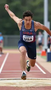 Athletics Jumper Wearing Socks Focused Sprinting Shot Put