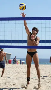 Beach Volleyball Blocker Wearing Ankle Band Alert Spiking