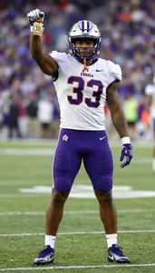Football Wide Receiver Wearing Football Cleats Standing