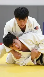 Judo Judoka Wearing White Belt Focused Grappling Hip Throw