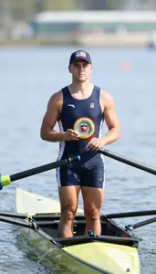 Rowing Sweep Rower Wearing Life Vest Posing Standing Proudly
