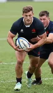 Rugby Sevens Scrum Half Wearing Rugby Shorts Determined